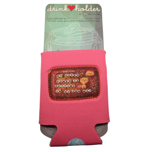 A pink neoprene drink holder can cooler with a glittery brown front pocket featuring a teddy bear design and the text 'MY SUPER POWER IS GETTING IN MY OWN WAY'. The holder is attached to a light green cardboard backing card with product details.