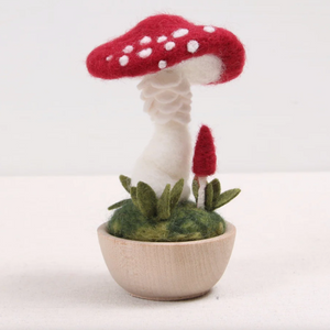 Needle Felted Crimson Toadstool mushroom displayed in a little wooden cup.