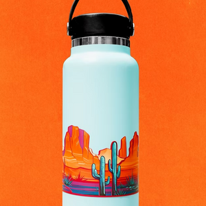 Light blue water bottle with a desert landscape design infinity sticker.