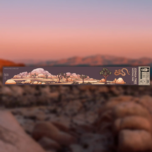 Joshua Tree landscape with mountains and trees on a large infinity sticker.