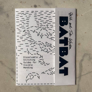 Batbat dissolvable stitching guide on a textured surface