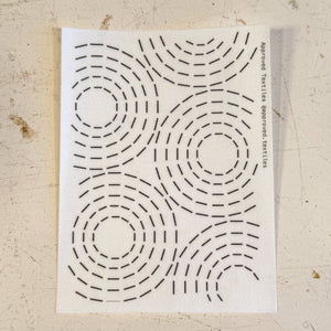Visible mending pattern sticker featuring a design of concentric circles
