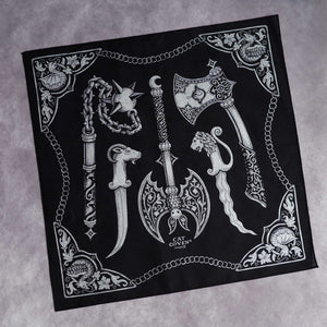 Black bandana with silver weapon designs on a gray background