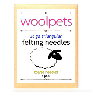 Packaging of woolpets felting needles with a sheep illustration on a white background.