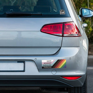 Car with a rainbow sticker on the back, featuring text 'Gays Against Parallel Parking'.