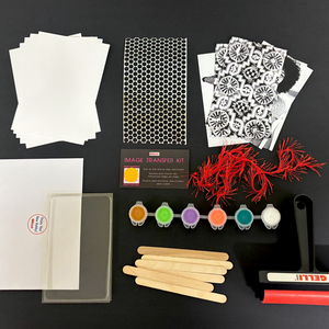 Items included in the gelli printing image transfer kit: paper, paint, a brayer, popsicle sticks, images, yarn, punchinella, plate.