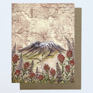 Greeting card with mountain and floral design on a vintage map background.