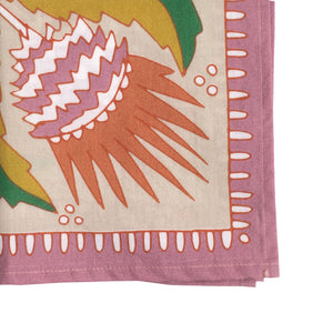 Detail of a corner of a floral patterned bandana.