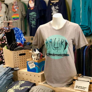 A mannequin wears a light gray shirt that has sealife spelling out Ballard - a neighborhood in Seattle.