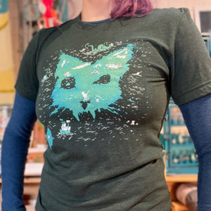 Person wearing a green catographer design tshirt in a store setting.