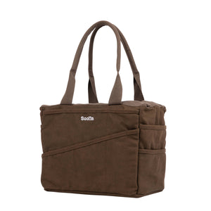 Brown tote bag with a visible brand logo on a white background