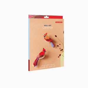 Packaging for a paper craft kit that makes wall art of a pair of cardinals.