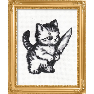 Gold framed cross stitch piece of a cute kitten holding a large knife.
