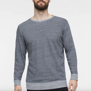 Man wearing a blue sweater against a white background