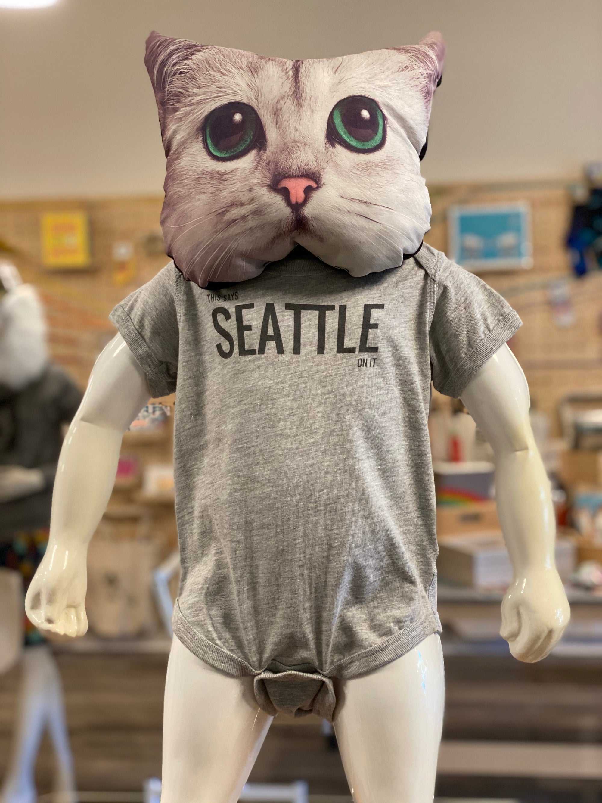 UB Onesie - This Says SEATTLE On It (Ugly Baby)