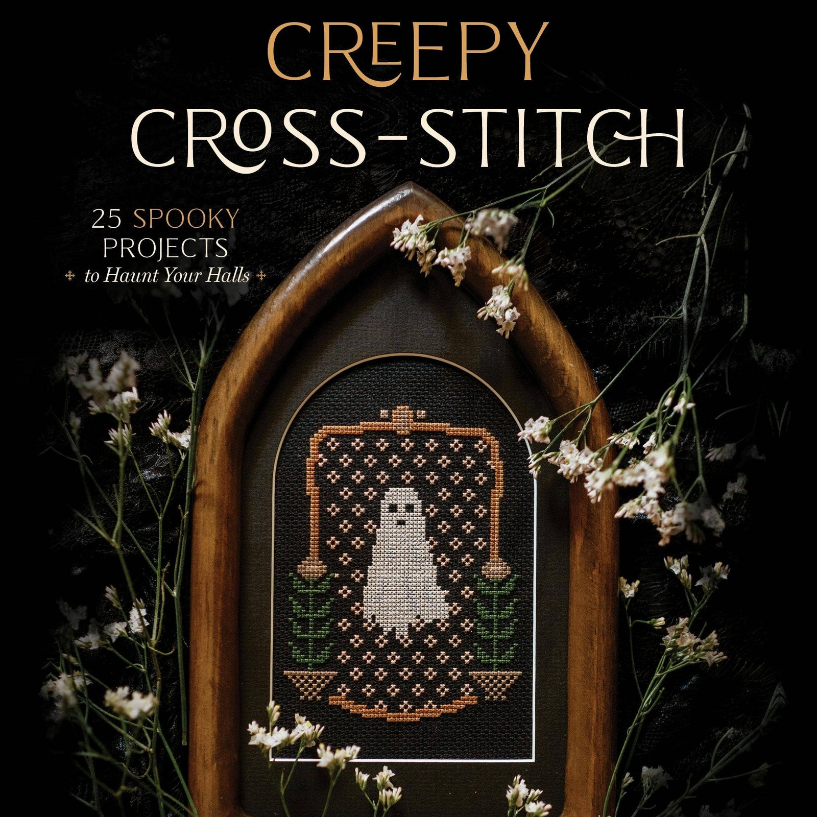 Book cover of 'Creepy Cross-Stitch' with a cross-stitched ghost design in a wooden frame.