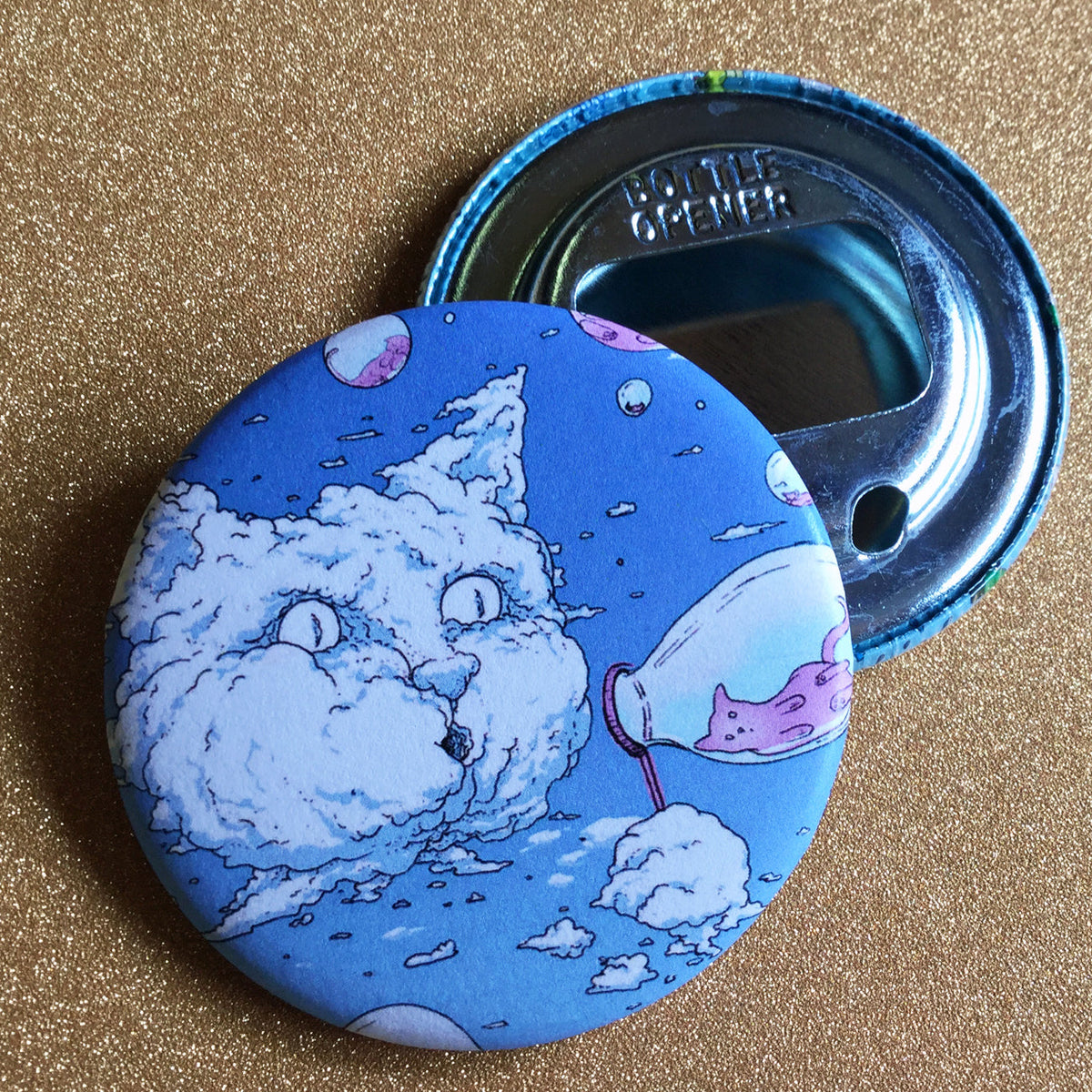 Bottler opener with our Bubble Cat design in blue against a glittery background. 