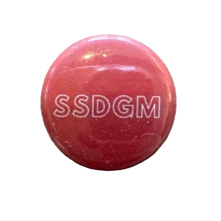 Red button with 'SSDGM' text on a white background.
