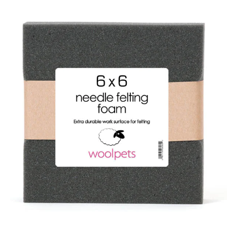 6x6 needle felting foam block with woolpets branding on a white background. 