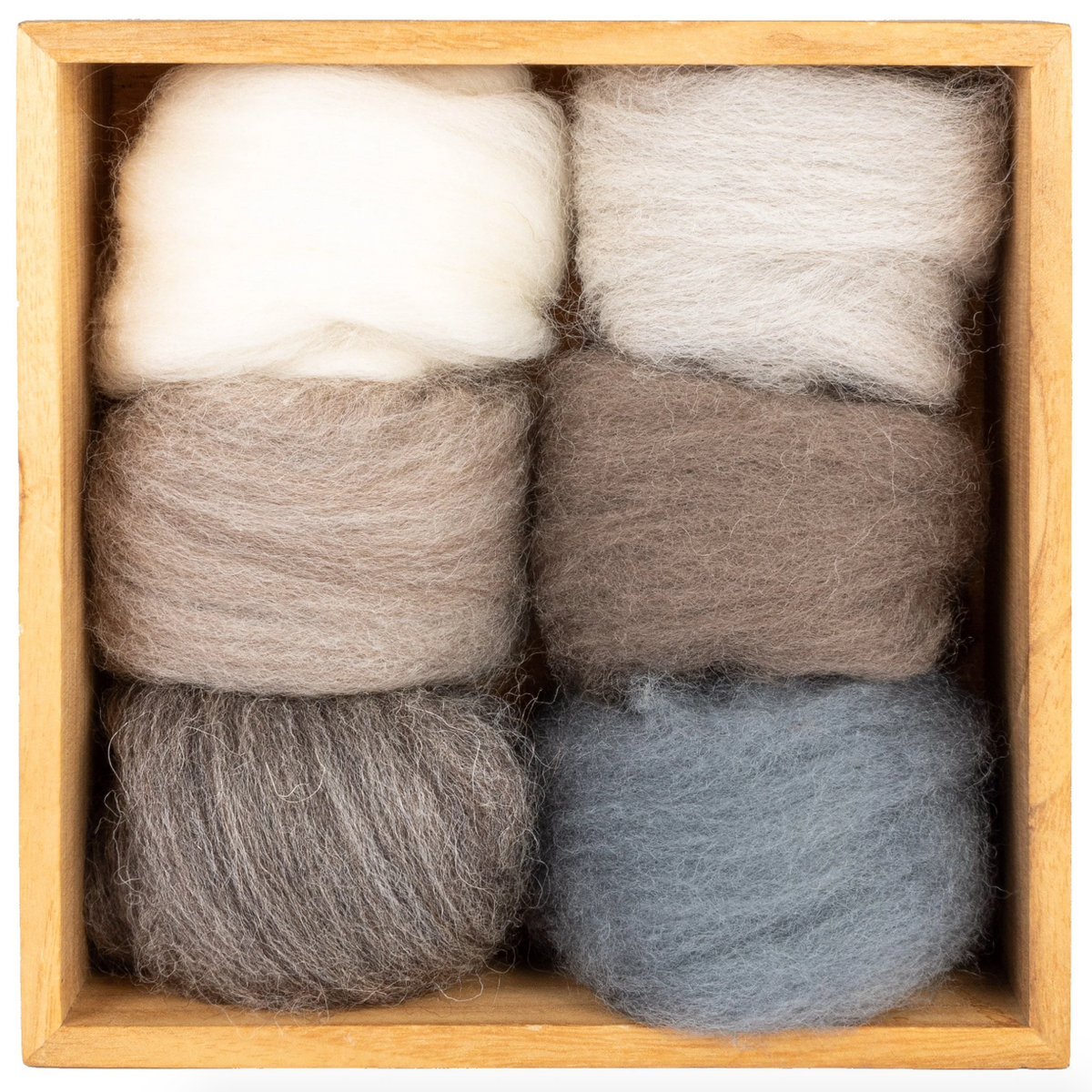 Set of six balls of roving in white, gray, and blue in a wooden box