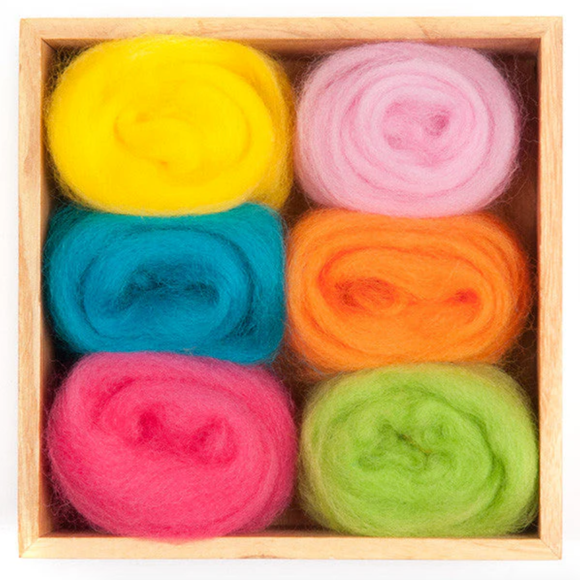 Set of colorful wool roving in a wooden box. 