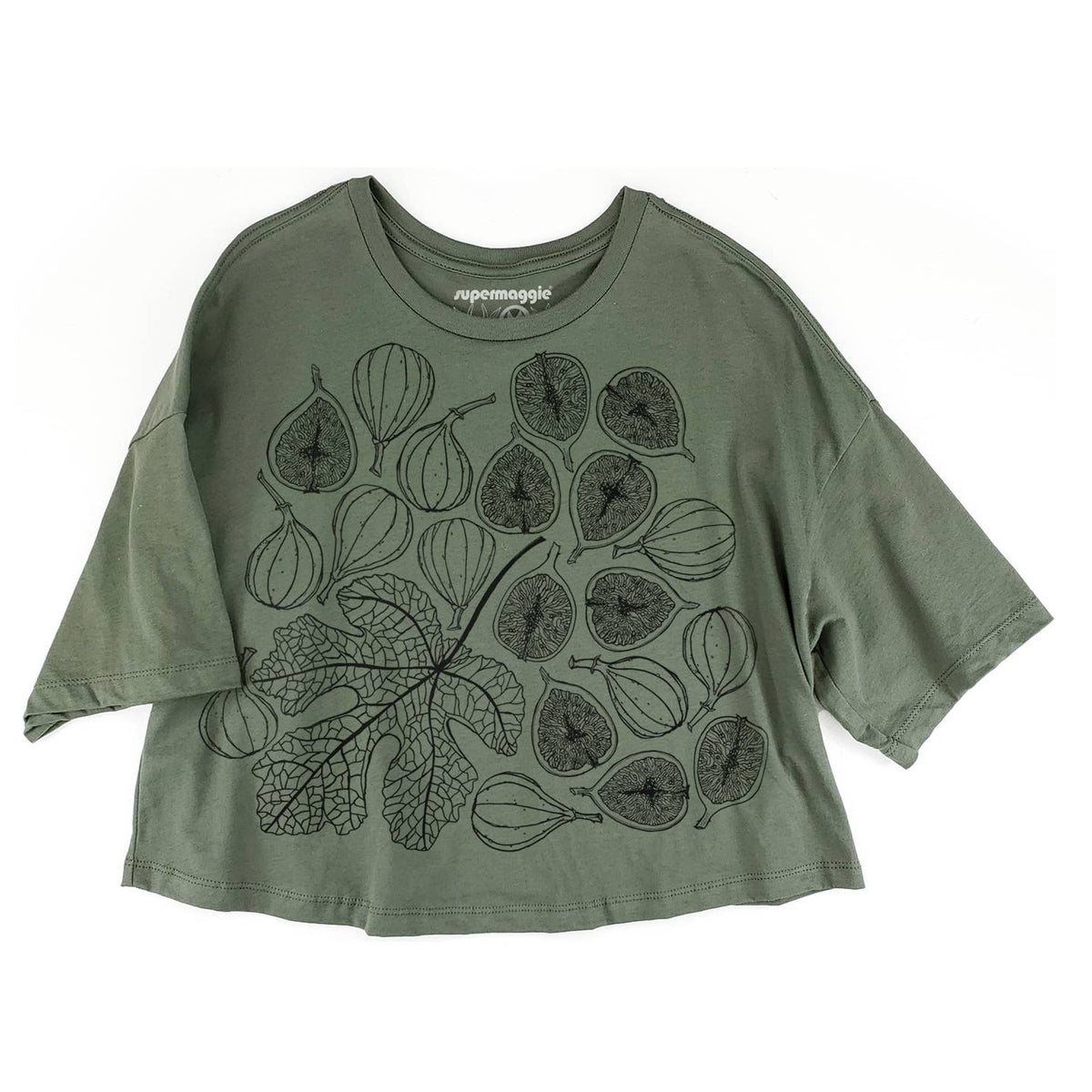 An oversized sage green t-shirt with a black line art graphic of figs and leaves, displayed flat against a white background.
