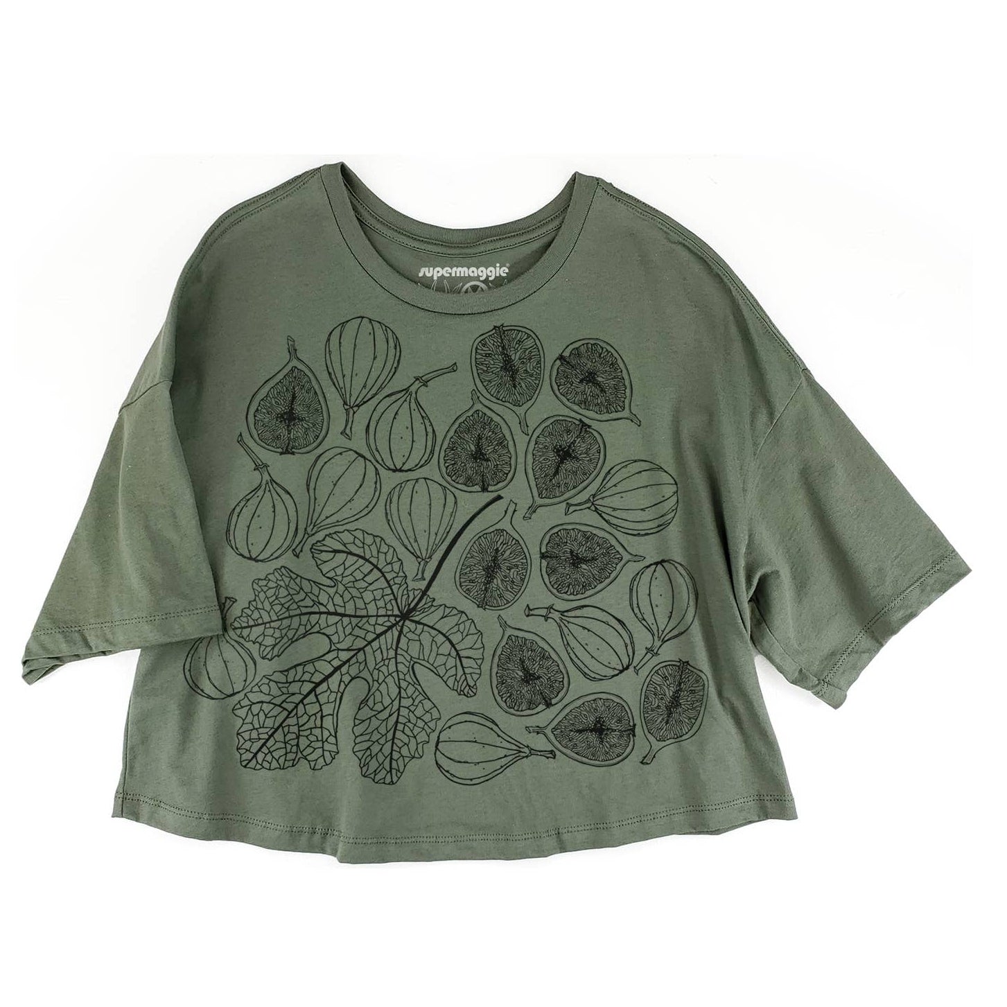 An oversized sage green t-shirt with a black line art graphic of figs and leaves, displayed flat against a white background.