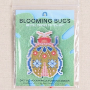 The Beetle version of the Blooming Bugs kit by Benzie Design laid flat on a table in the packaging.