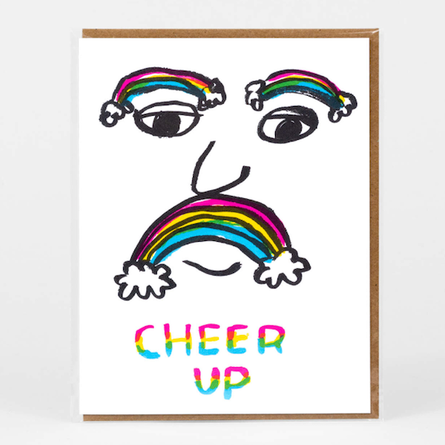 Greeting card with a colorful face with rainbow hair and 'Cheer Up' text on a white background. 
