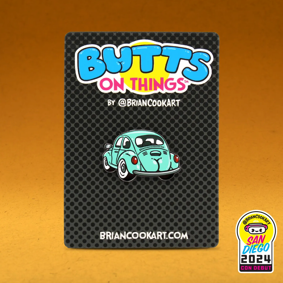 Pin with a VW car with a butt design on a textured card with 'Butts on Things' branding.