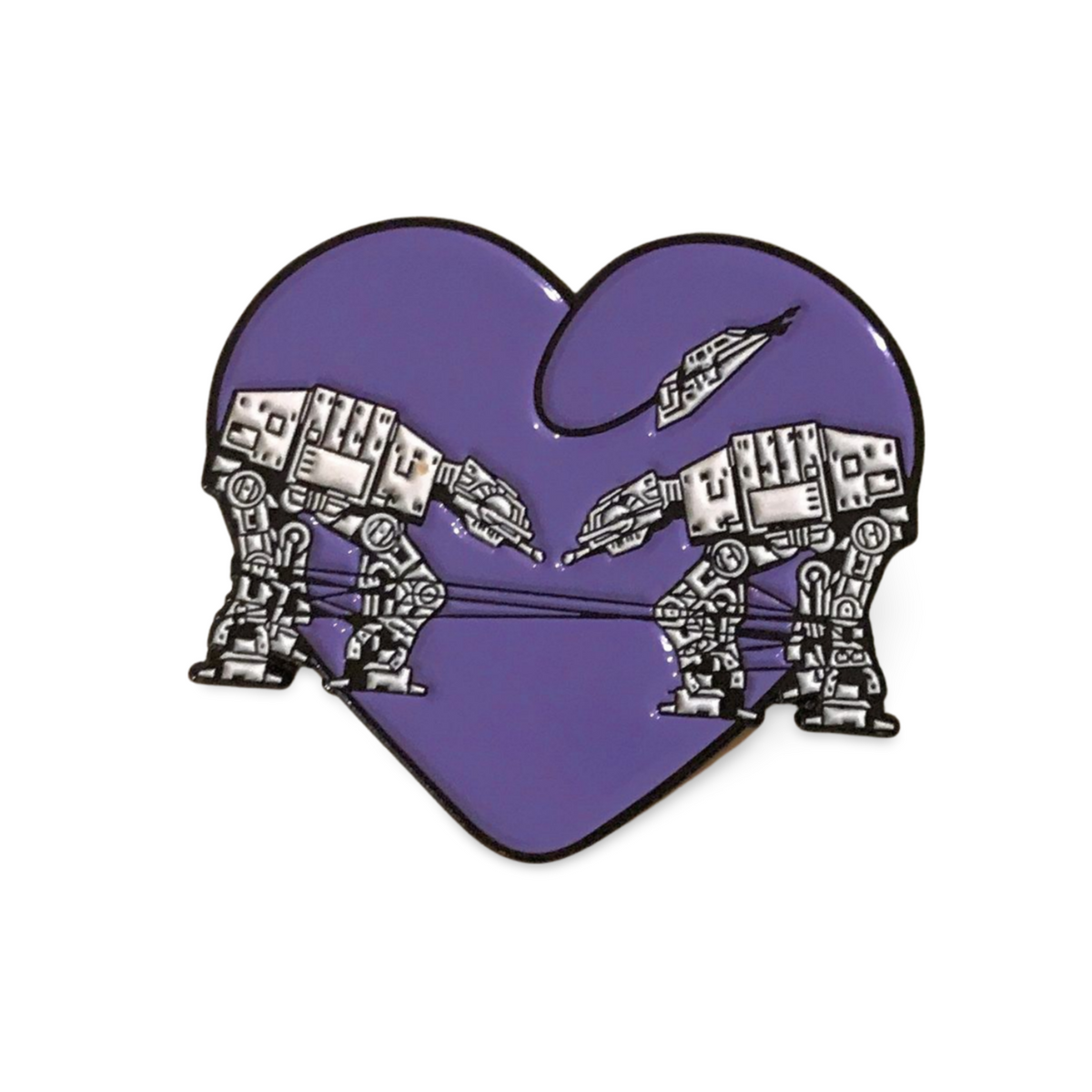 Heart shaped enamel pin called Love AT-AT First Sight with a purple background. 
