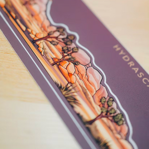 Mini infinity sticker with a Joshua Tree National Park scenic design and 'HYDRASCAPE' branding.