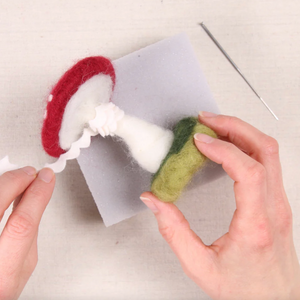 In progress shot of the Crimson Toadstool mushroom needle felting kit. 