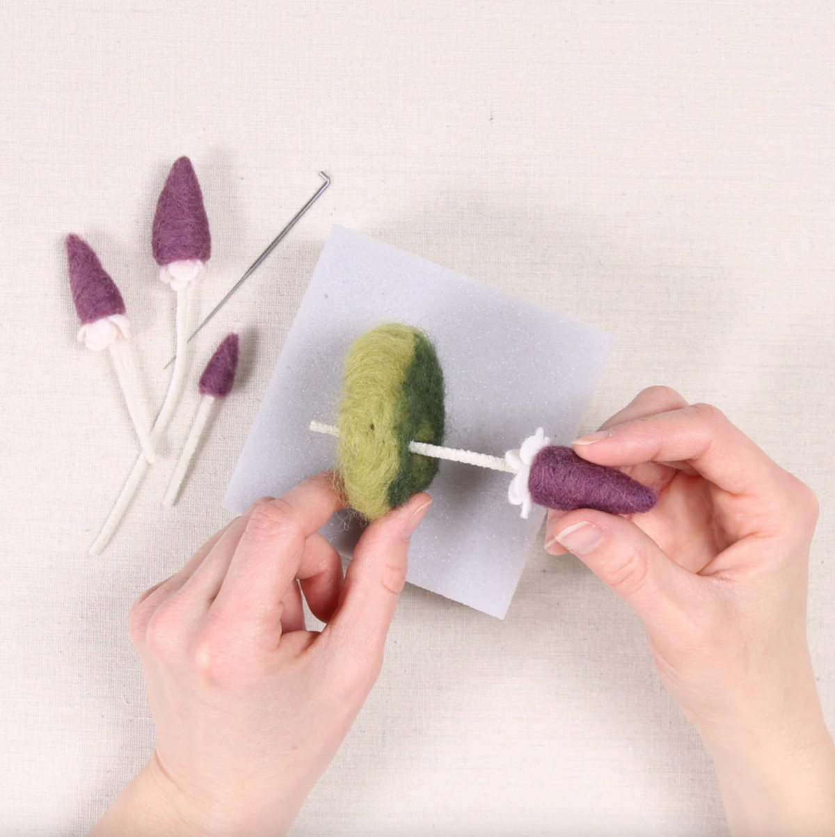 The pixie parasol mushroom needle felting kit in progress.