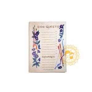 Notebook with floral design and arrows, labeled 'Rewards', on a white background.