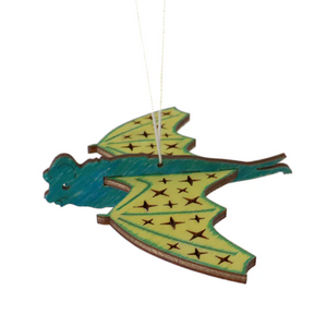 Decorative wooden painted freetail bat dragon on a white background