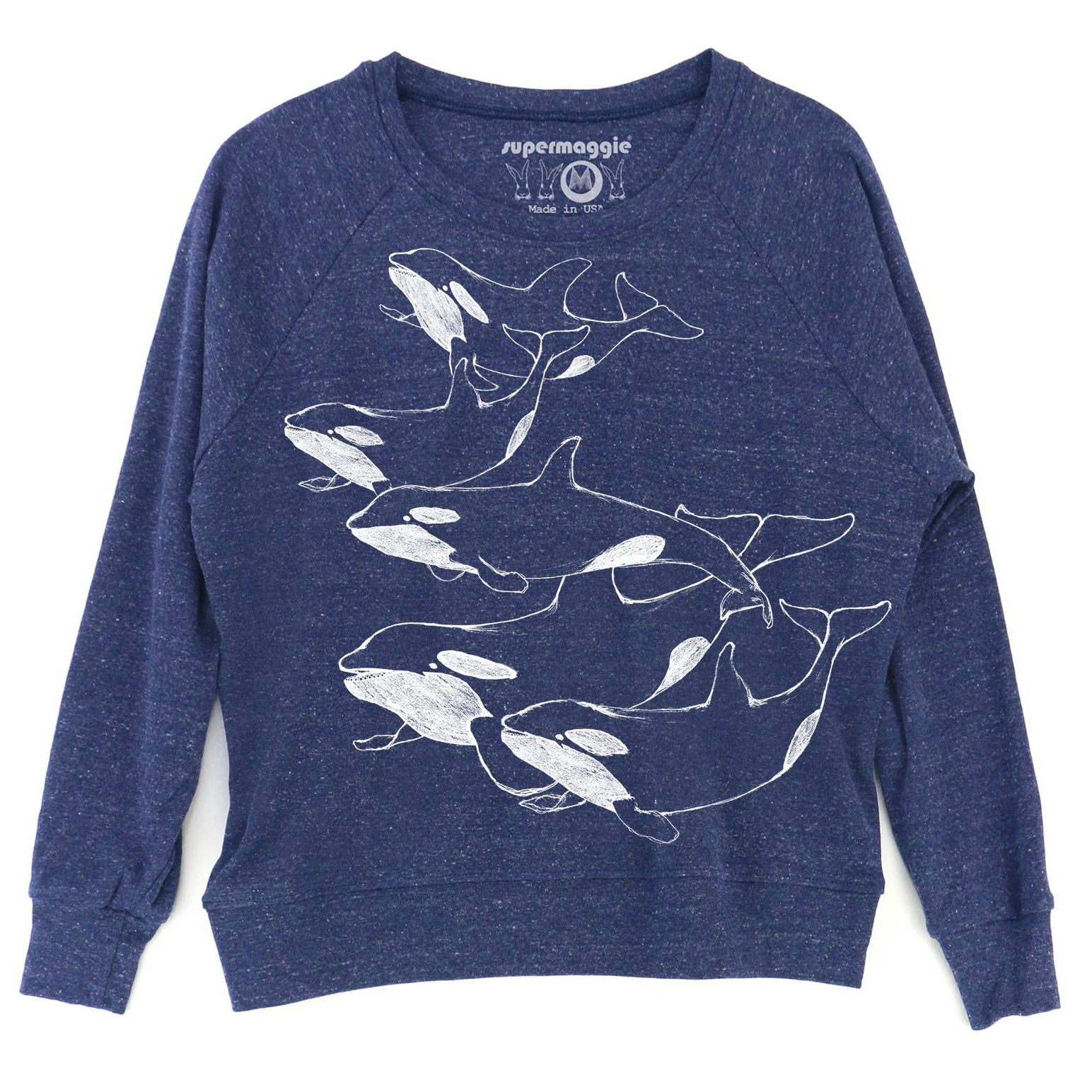 A blueberry colored crewneck sweatshirt featuring a white line art graphic of four orcas on the front, with the 'supermaggie' brand logo printed inside the collar.