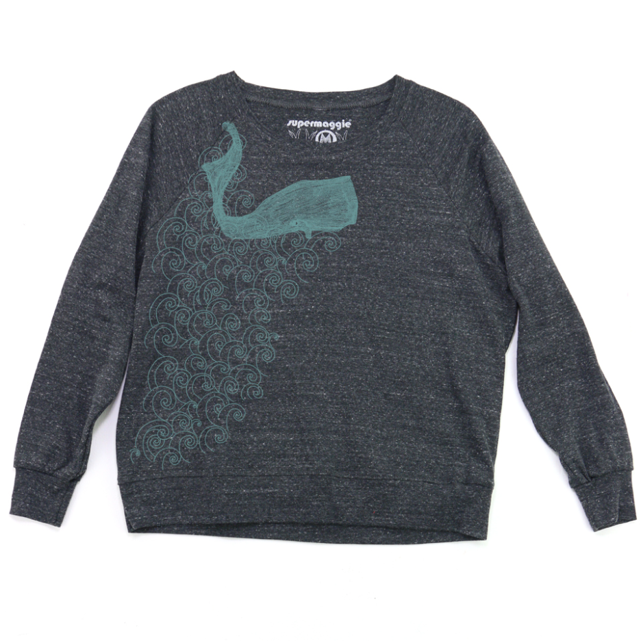 Gray sweater with a green whale design on a white background. 