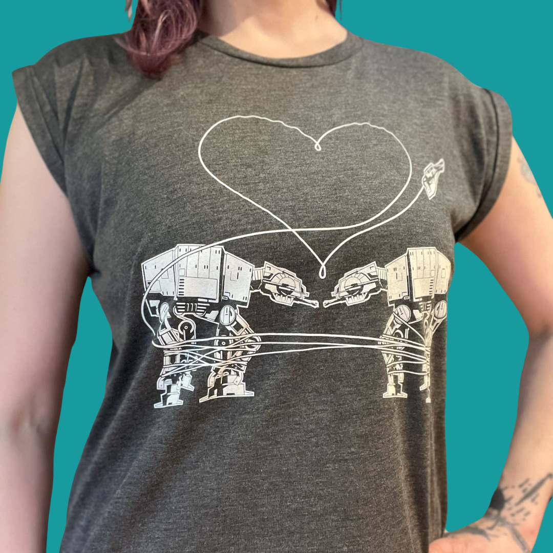 Two All Terrain Armored Transport Vehicles Falling in Love on a gray feminine muscle tshirt. 