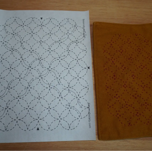Patterned paper and fabric on a wooden surface