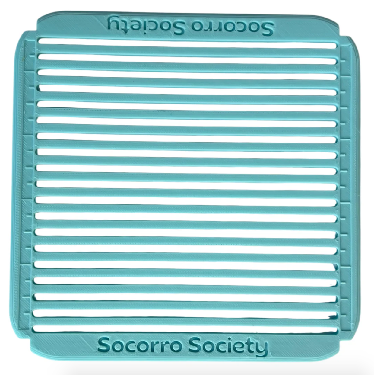 Teal grid stencil with 'Socorro Society' branding on a white background