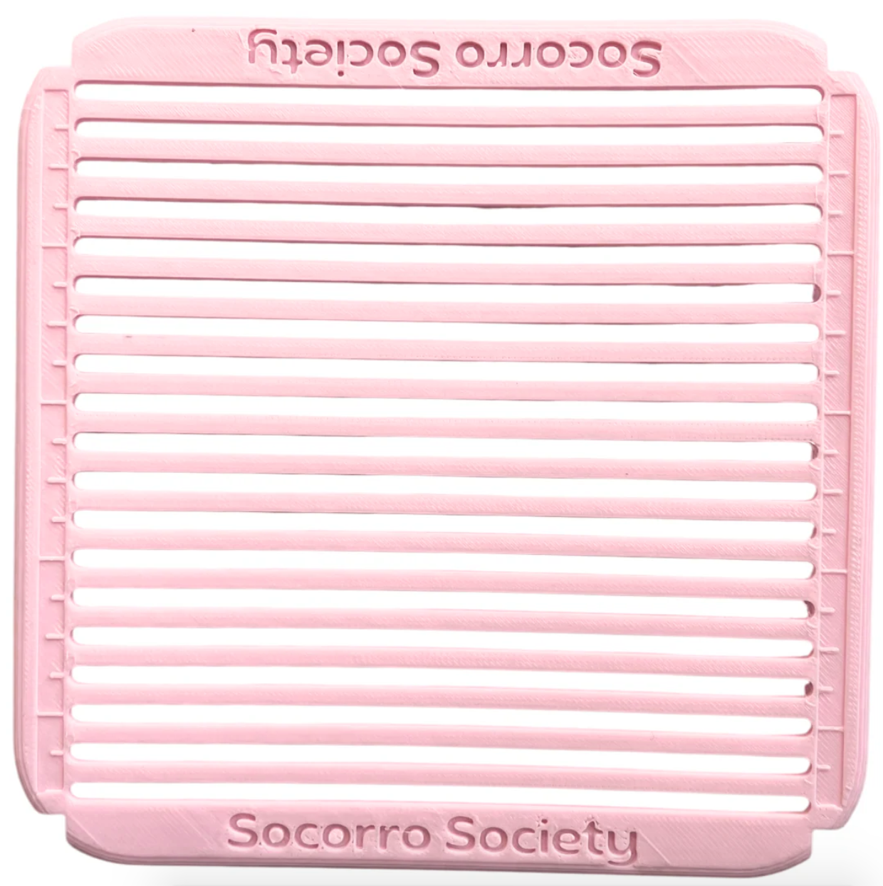Pink Sashiko grid stencil with 'Socorro Society' branding on a white background. 