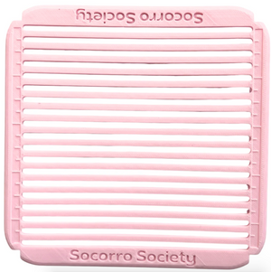 Pink Sashiko grid stencil with 'Socorro Society' branding on a white background. 
