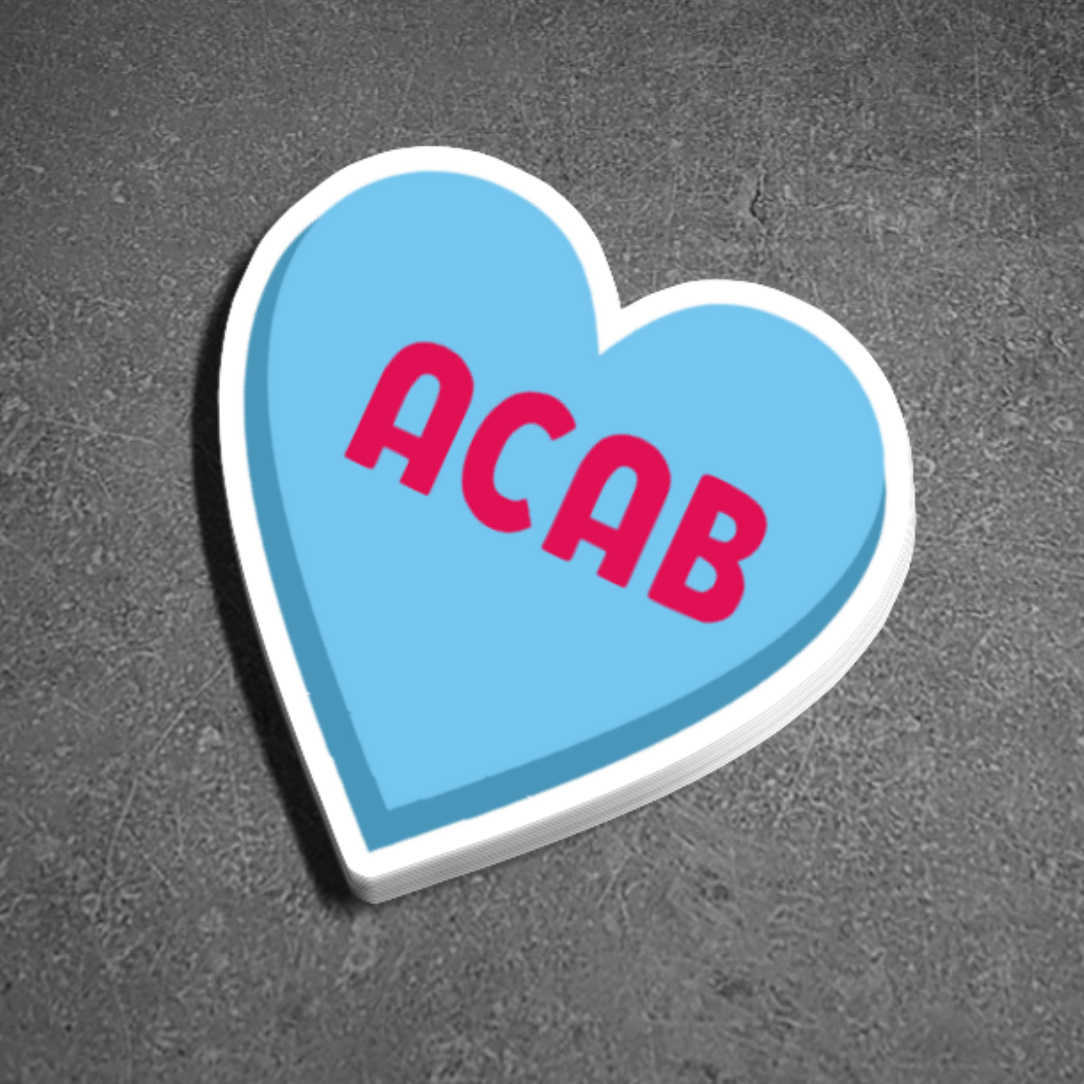 Heart-shaped sticker with 'ACAB' text on a gray background