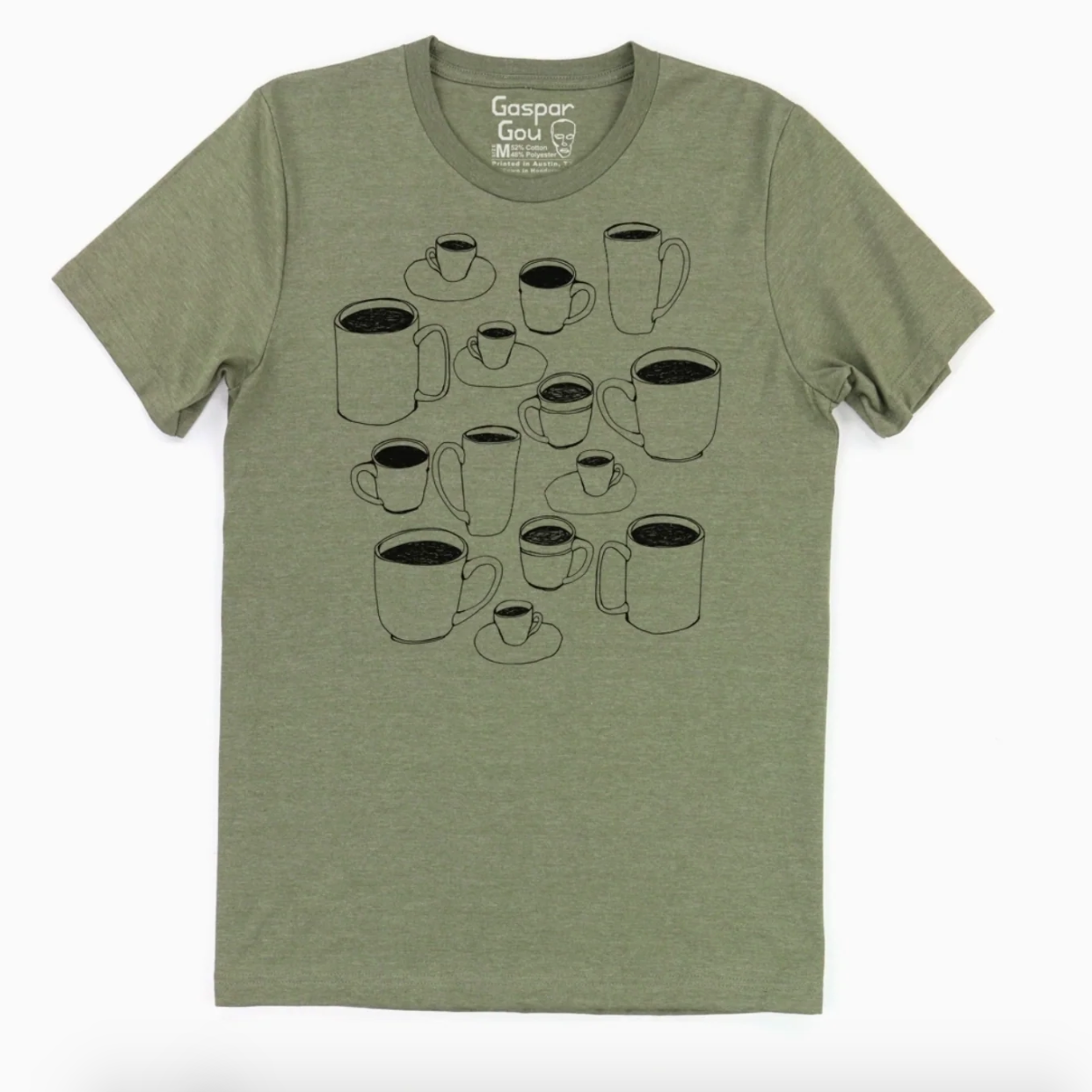 Green t-shirt with black coffee cup graphic design on a white background. 