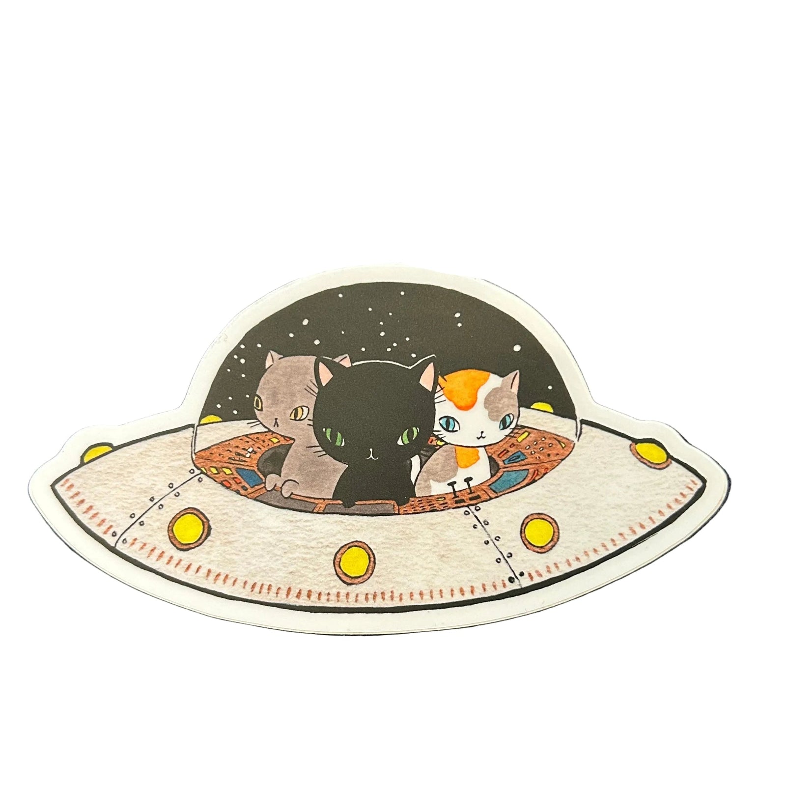 Sticker of cats in a UFO on a white background.