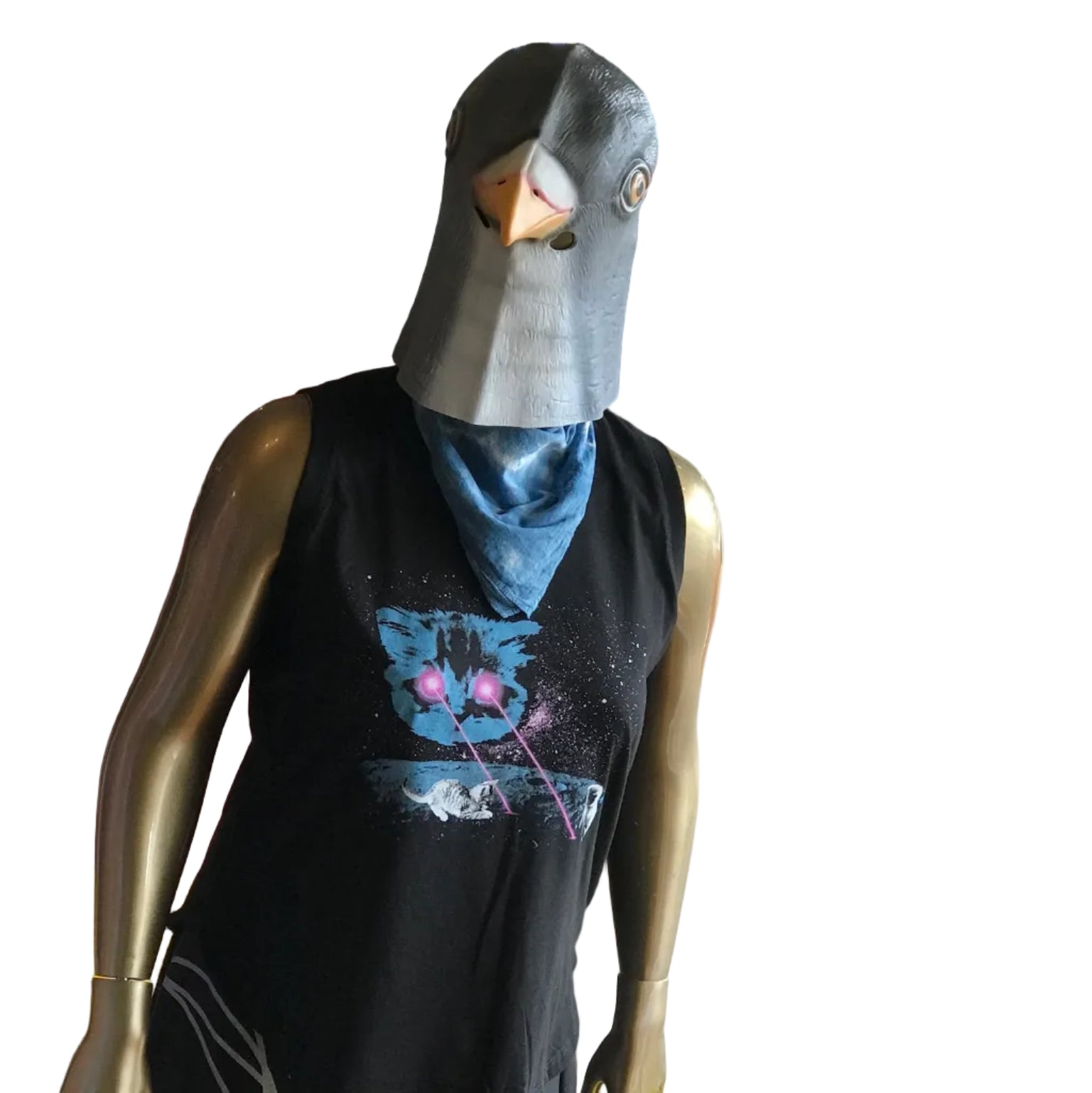 A mannequin wearing a black sleeveless top with a colorful cat graphic and a gray bird mask, standing in a store window.