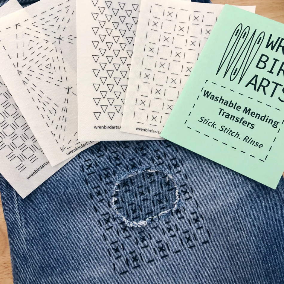 An example of each of the four washable mending transfer sheets included in this packet. There is also a stitched up example on a pair of jeans.