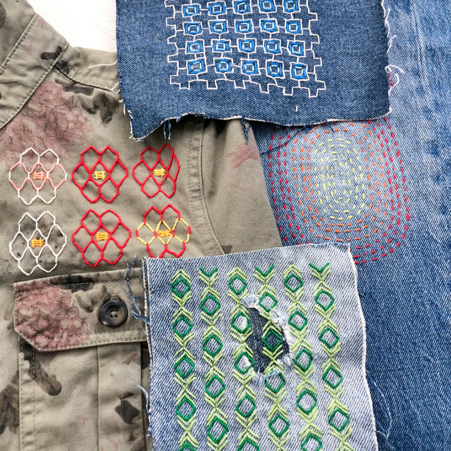 Stitched up examples of the four visible mending washable transfers included in this pack. Three of them are stitched up on denim and another is stitched onto a jacket.