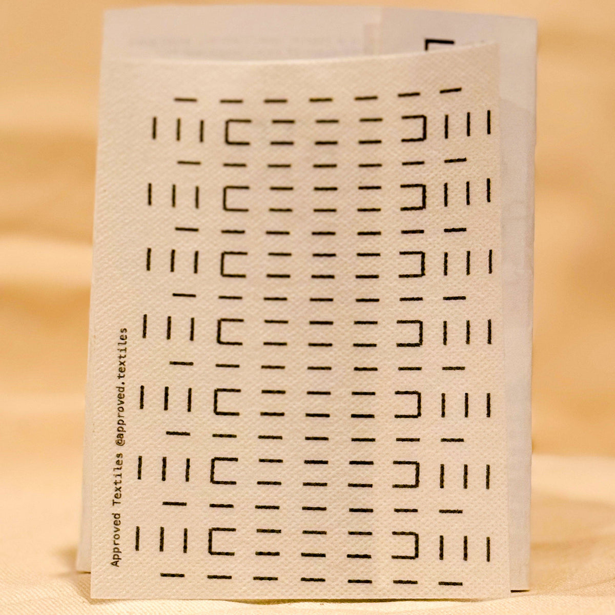 Visible mending pattern sticker featuring a grouping of horizontal and vertical lines